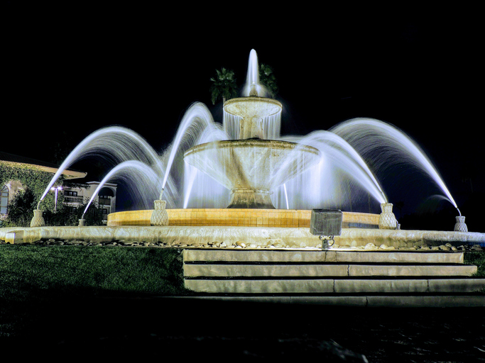Night vision of a round fountain in Arizona USA.